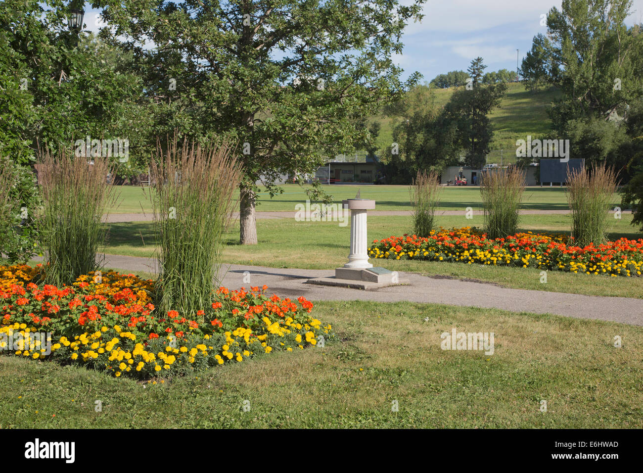 Flower garden with sundial in Riley park, Calgary, Alberta, Canada