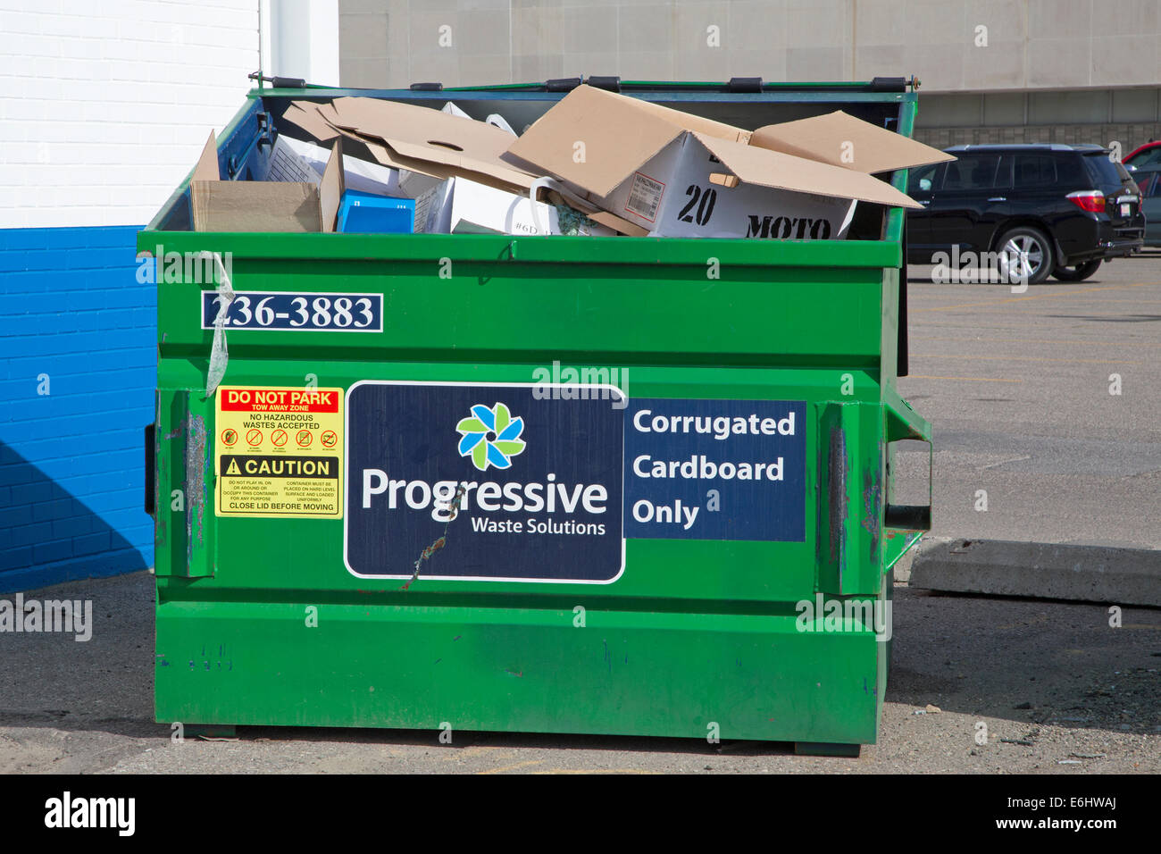 Recycle bin for corrugated cardboard Stock Photo Alamy