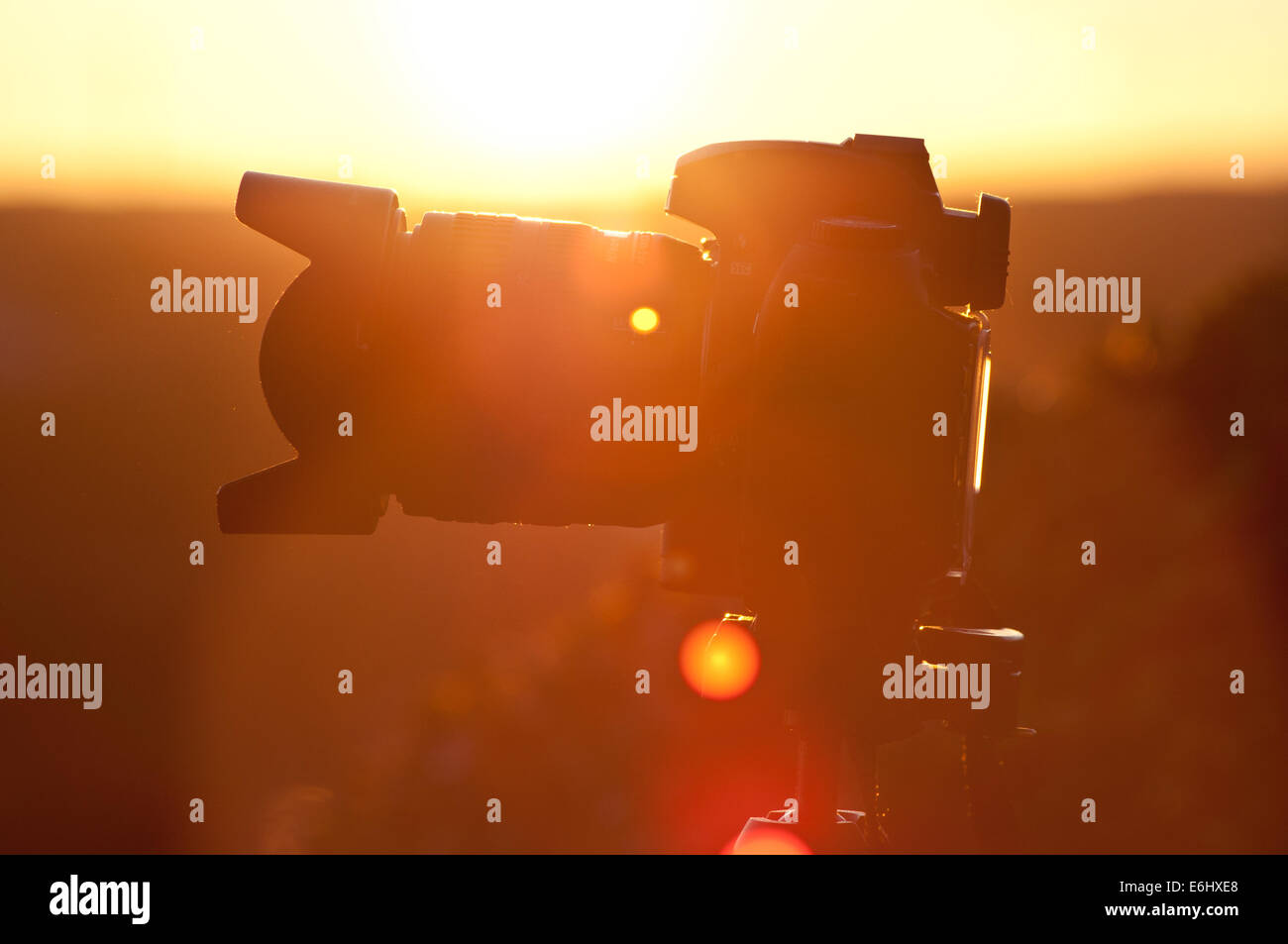 Sunset over reflex camera Stock Photo
