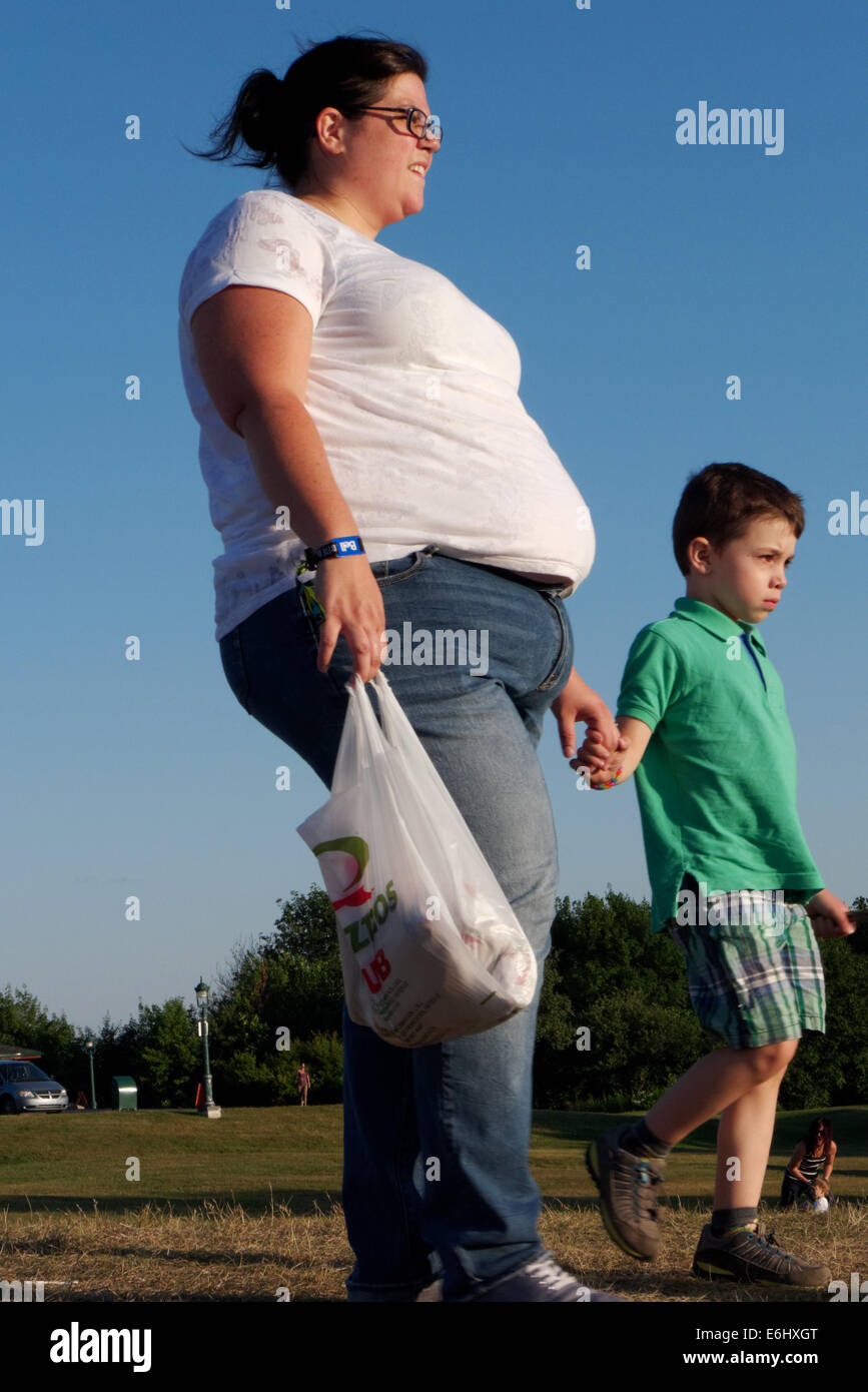 An obese woman with a young child Stock Photo