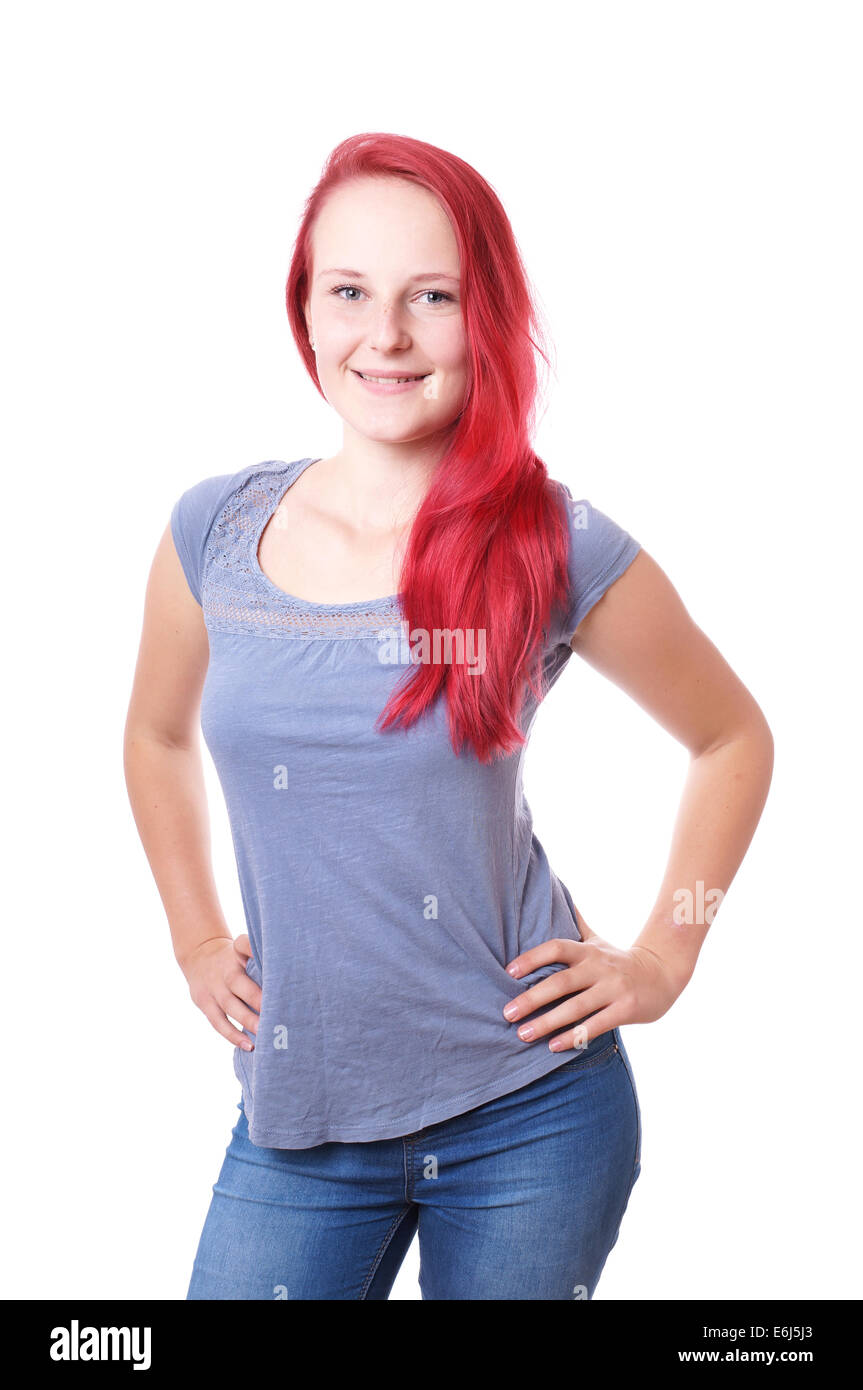 Teen girl wearing red top and blue jeans hi-res stock photography