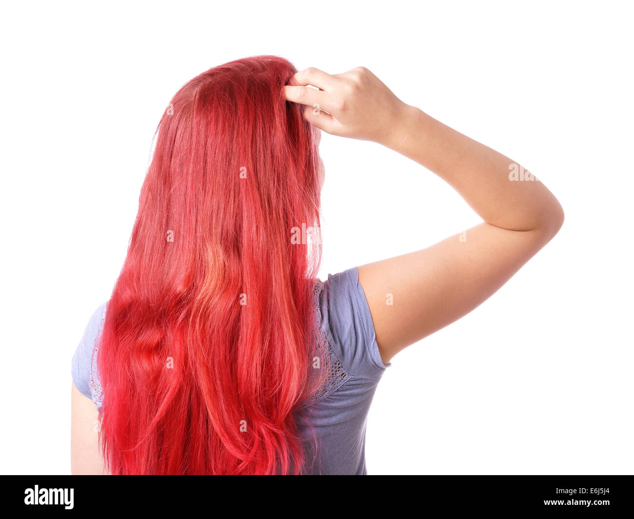 rear view of a woman thinking and scratching her head Stock Photo