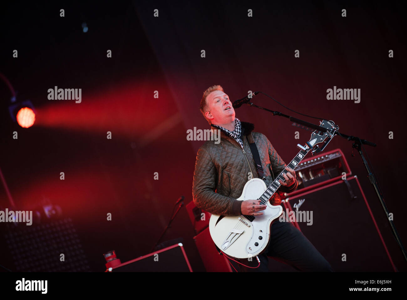 Leeds, UK. 23rd August, 2014. Josh Homme from Queens of the Stone Age performs on Day 2 of the Leeds Festival at Bramham Park on August 23, 2014 in Leeds, England. Credit:  Sam Kovak/Alamy Live News Stock Photo