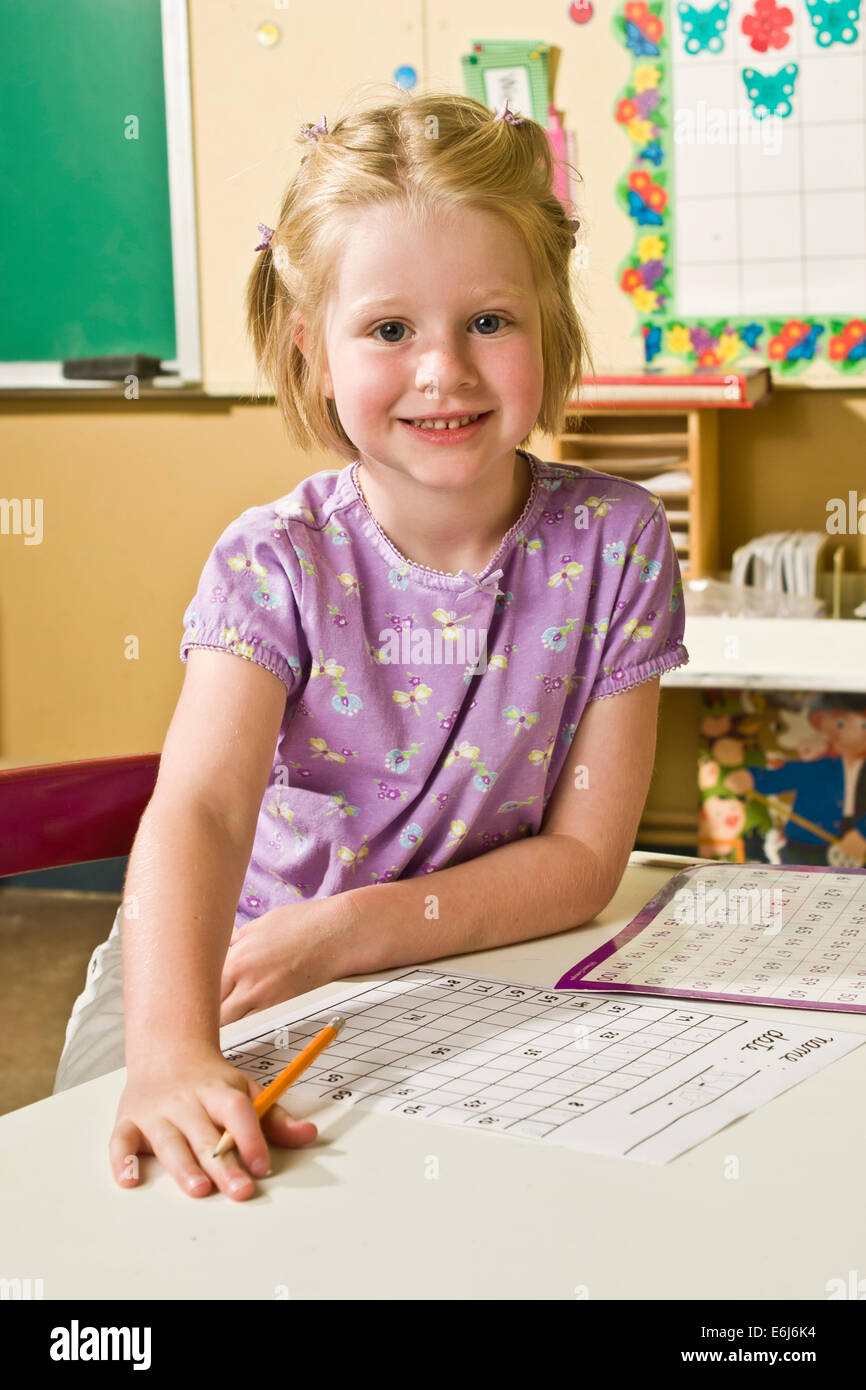 Smiling 4-5 years year old caucasian  pre-k student students girl in classroom United States  MR © Myrleen Pearson Stock Photo