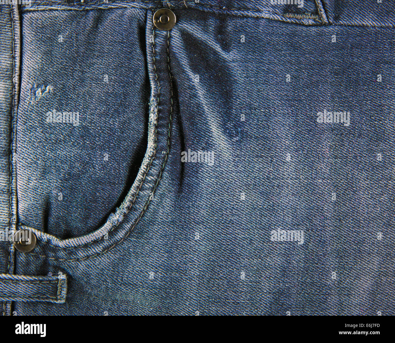 Closeup of blue jeans pocket for background or texture Stock Photo