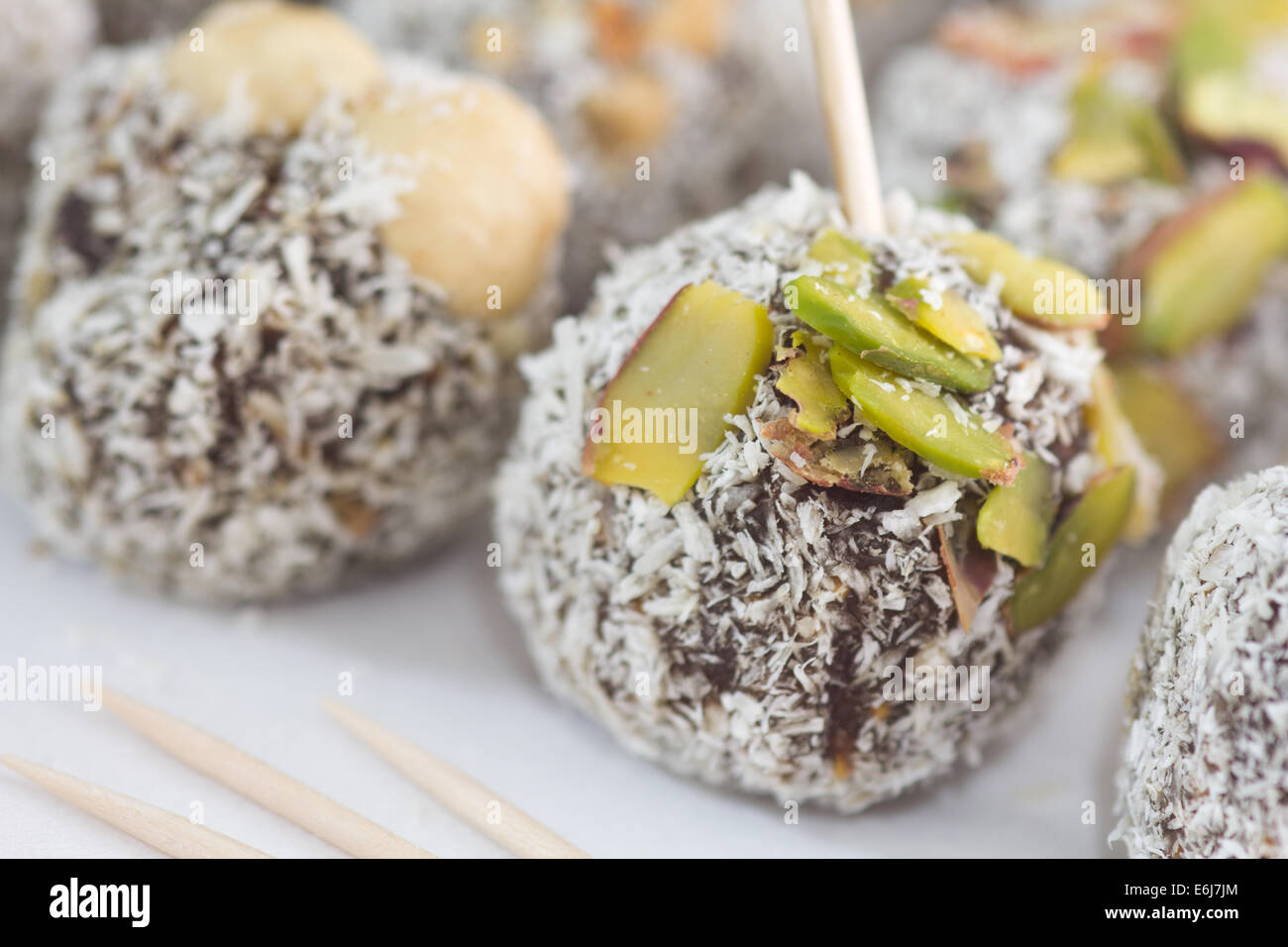 Special Turkish Fig Dessert topped with coconut powder, nuts and pistachio. Stock Photo