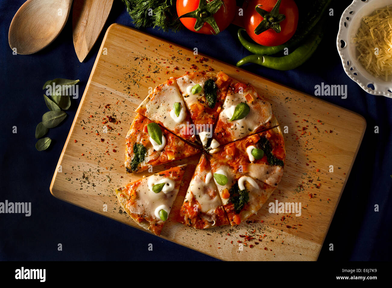 Italian pizza with mozerellla on dark and mood table setting Stock ... Italian pizza with mozerellla on dark and mood table setting Stock ...