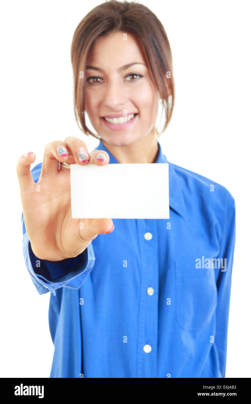 beautiful smiling woman in blue shirt holds out a business or credit card Isolated on white background, copy space advertising Stock Photo