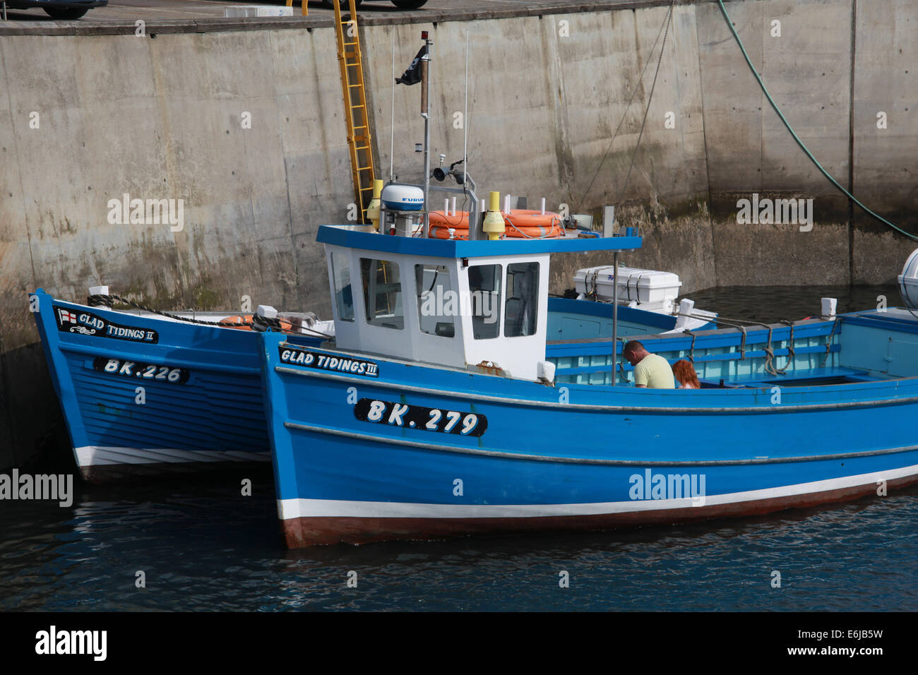BK279 blue fishing boat at Seahouses harbour , Glad Tidings - Northumberland, NE England, Great Britain, UK Stock Photo