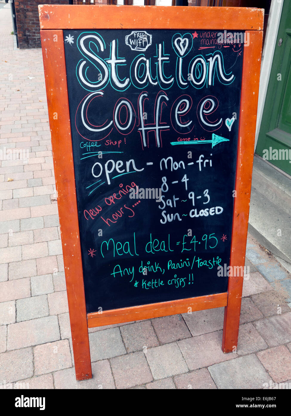 Station Coffee,independent cafe,resisting Costa and Starbucks, outside blackboard Stock Photo