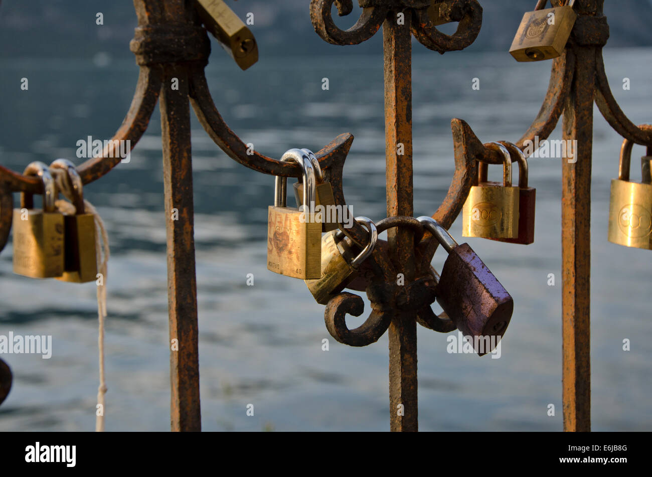 Love locks or padlocks at a fence in Iseo, Lombardy, Italy. Stock Photo