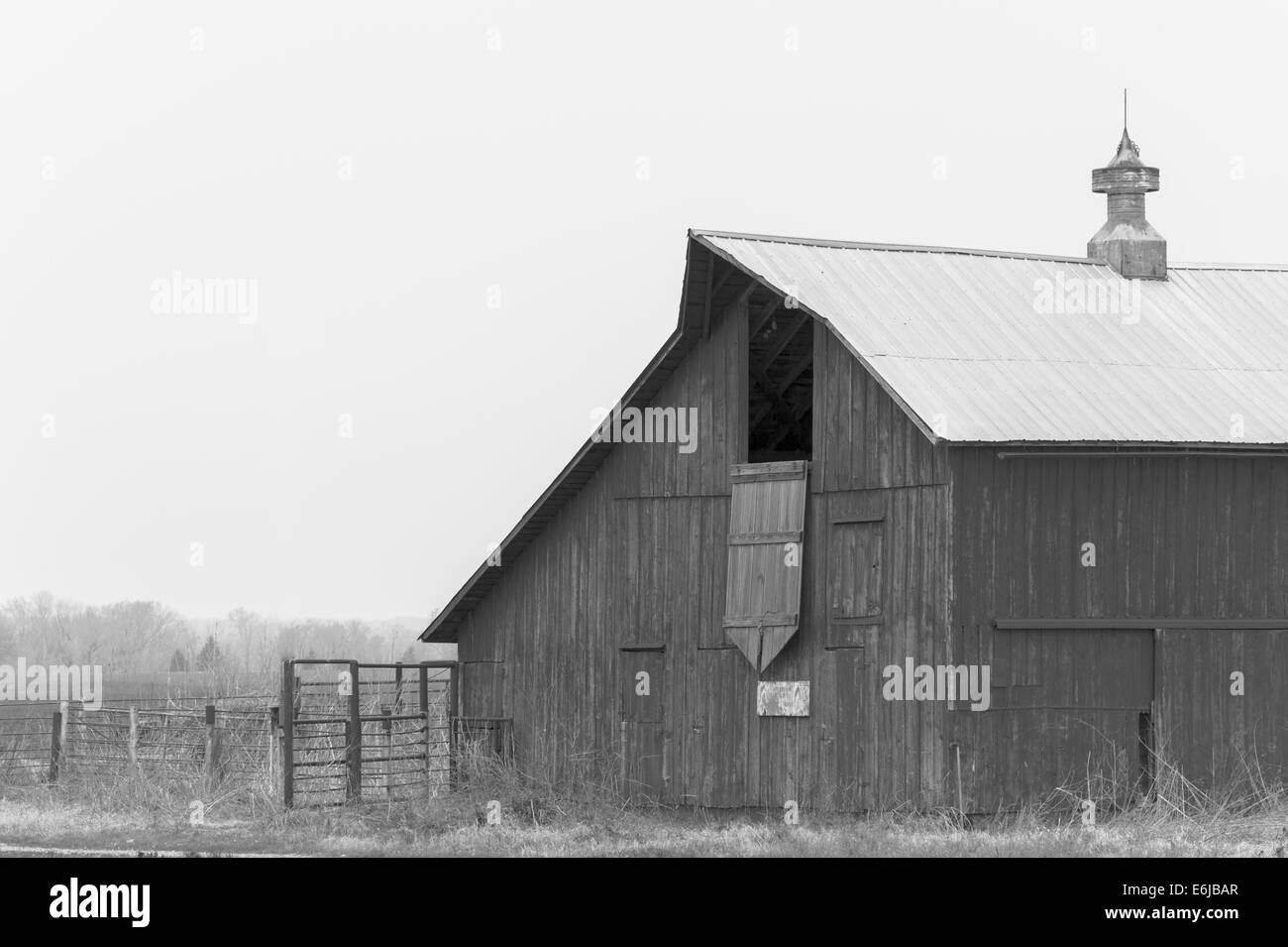 Old weathered wood barn in black and white Stock Photo