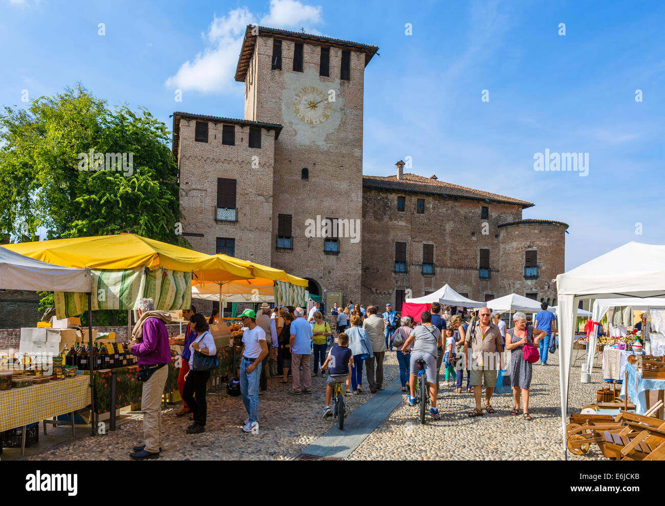 Sunday market in front of Sanvitale Castle (Rocca Sanvitale) in historic old town of Fontanellato, Parma, Emilia Romagna, Italy Stock Photo