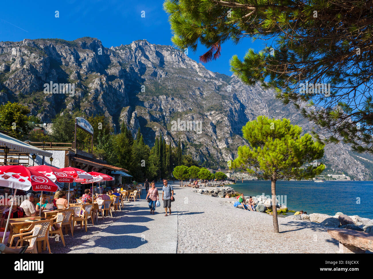 Lakefront cafe on the beach in Limone sul Garda, Lake Garda, Lombardy, Italy Stock Photo