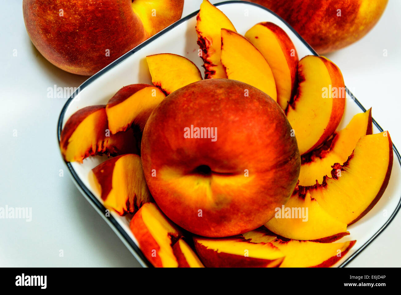 sliced fresh ripe peaches ready to eat Stock Photo - Alamy