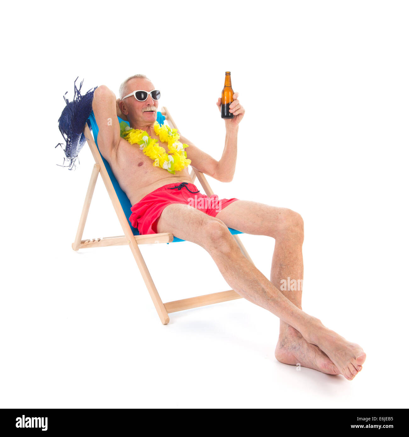 Retired Man On Vacation Sitting In Beach Chair Drinking Beer Stock Photo Alamy