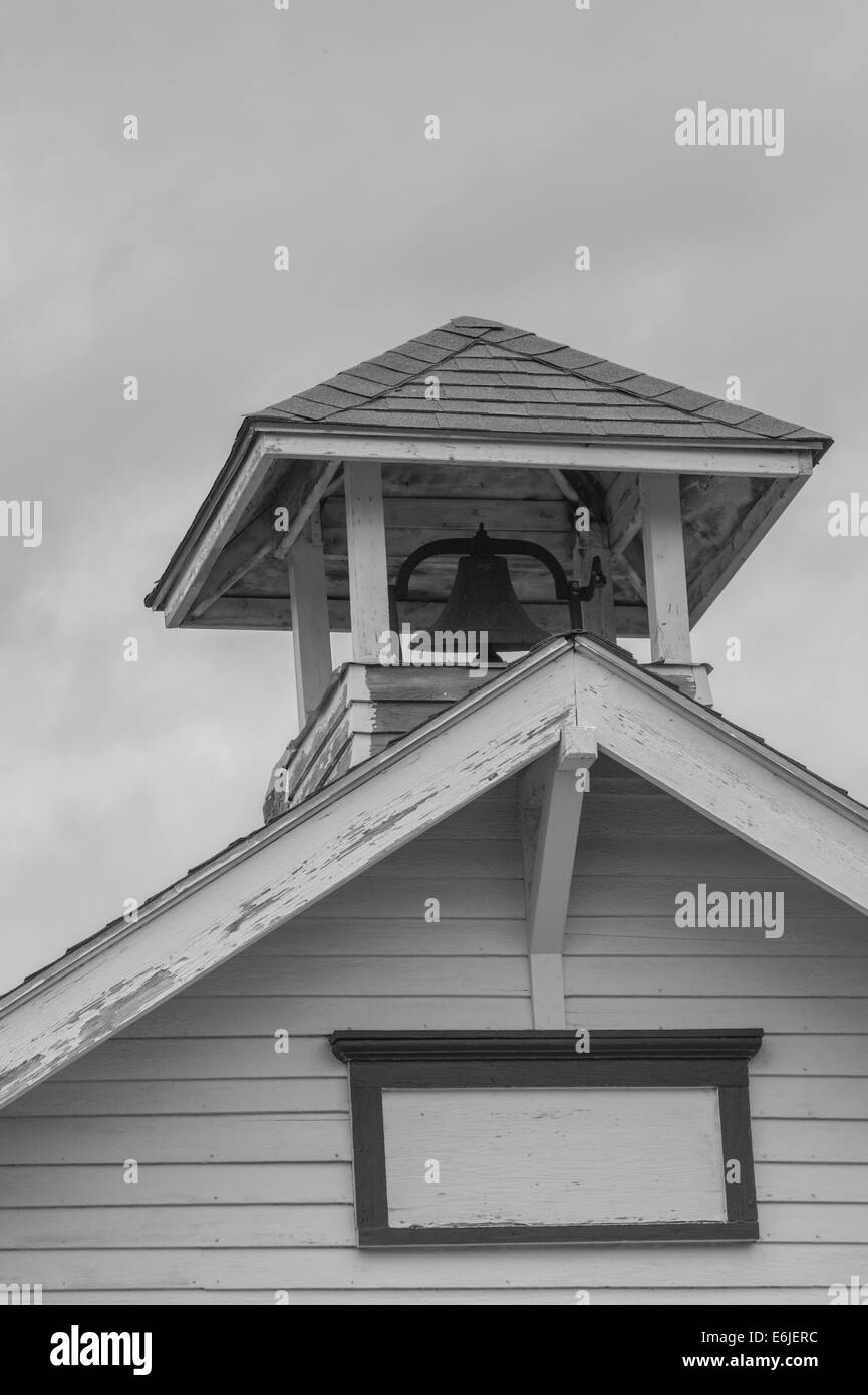 Old one-room school house bell cupola in black and white Stock Photo