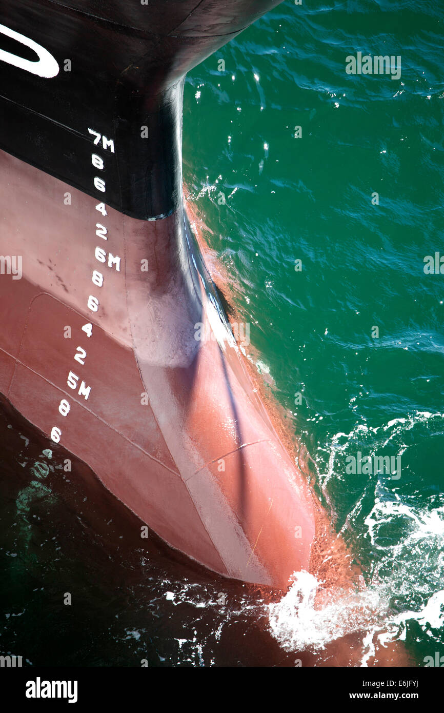Tanker ship's bulbous bow below the waterline draft line is shown Stock Photo