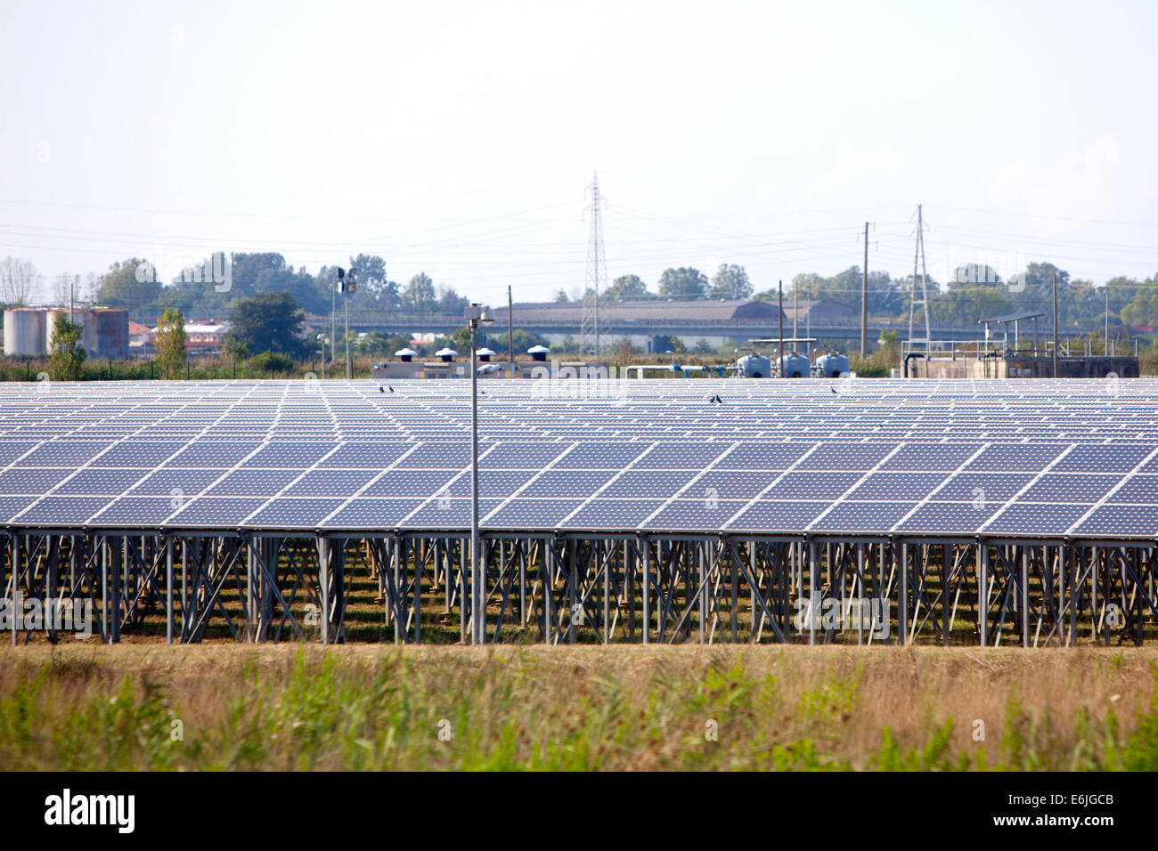 Solar Farm a large-scale application of Solar Photovoltaic PV installation used to generate electricity in Italy Stock Photo