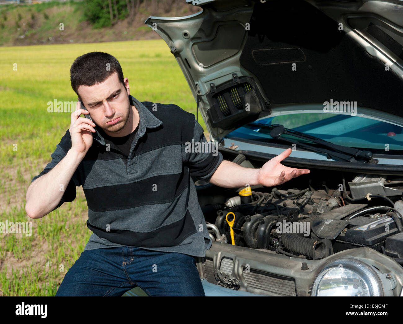 He is Mending his car