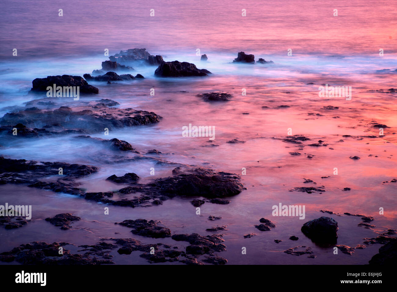 Sunset reflection at low tide. Lanai, Hawaii. Stock Photo