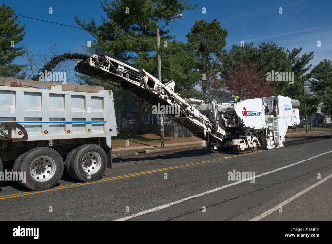 Pavement milling, cold planing, asphalt milling, or profiling machine prepared road in Hartford for repaving Stock Photo