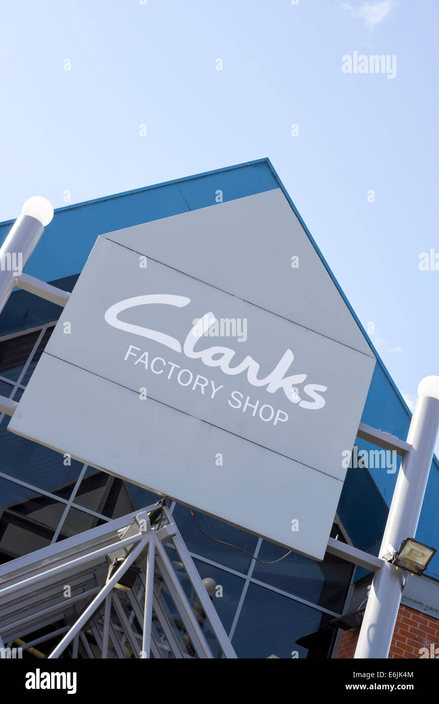 Sign over the entrance to a Clarks Factory shop in Blackpool, Lancashire Stock Photo