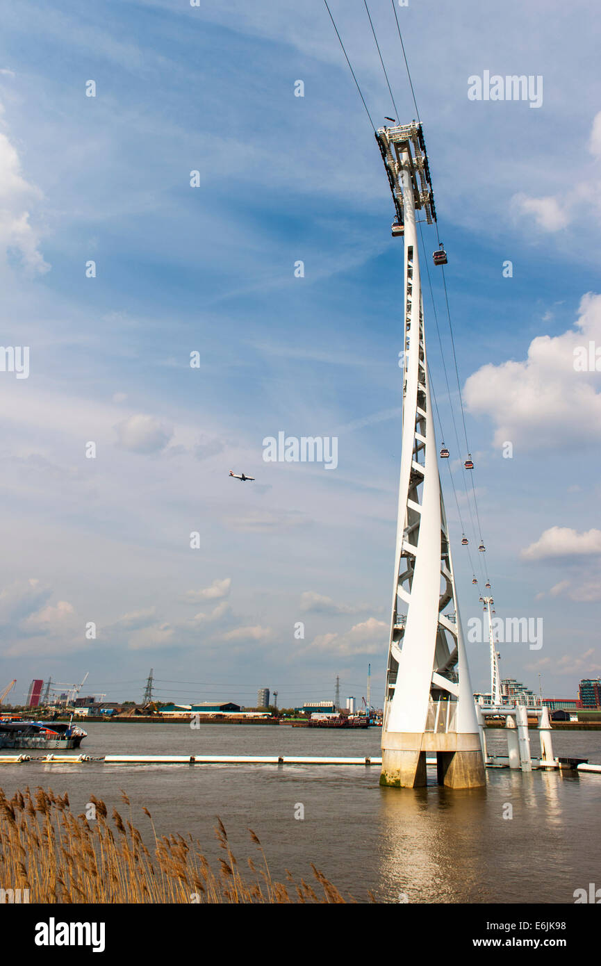 Cable Car Across the River Thames at Greenwich. The flight goes between the O2 Dome at Greenwich to the Royal Docks. Stock Photo