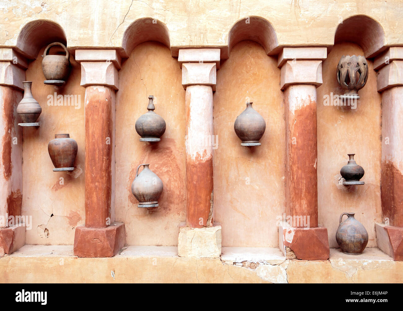 Old earthenware crockery and set of arches in Agadir, Morocco Stock Photo