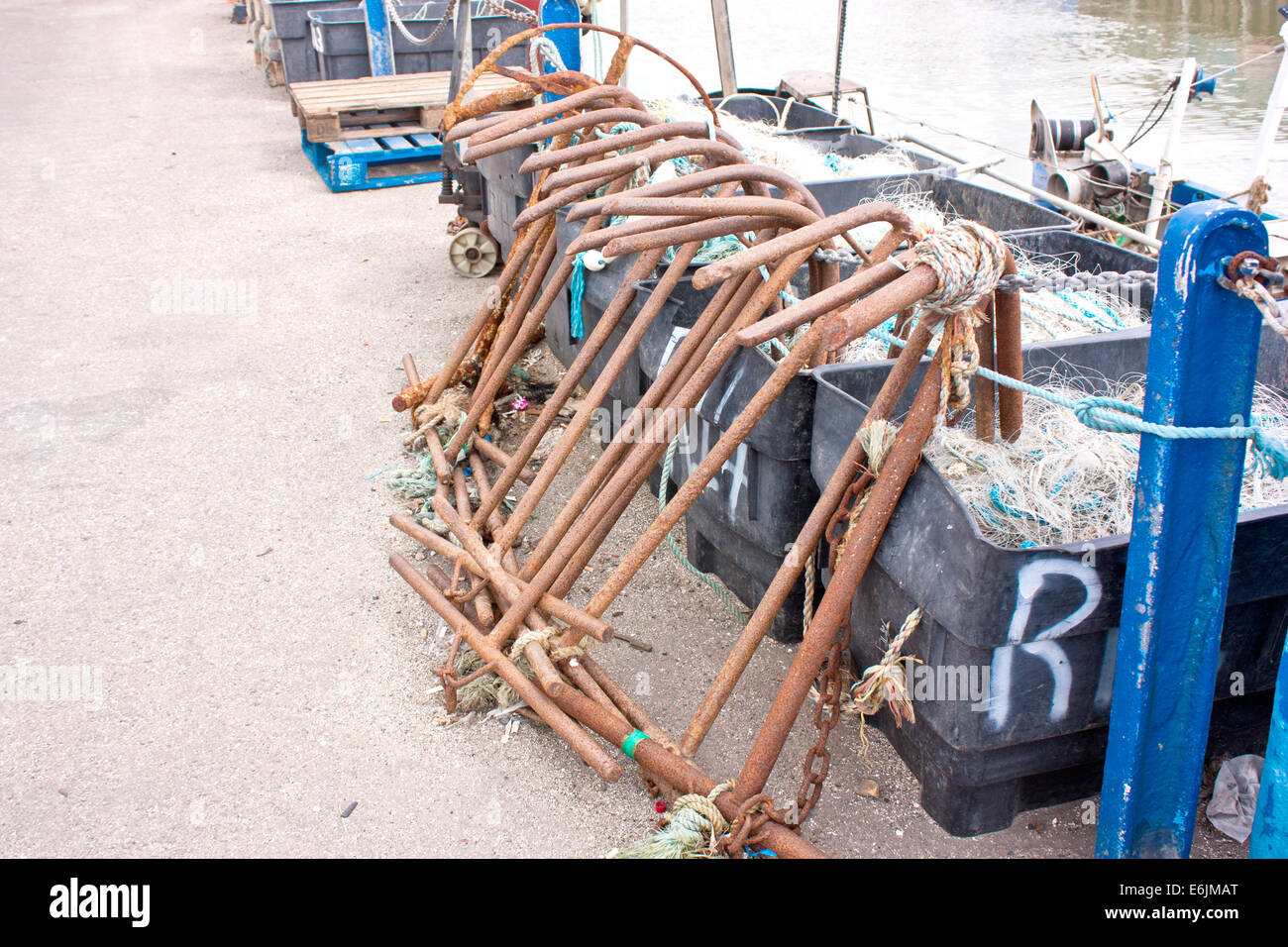 A row of rusty anchors at Whitstable harbour Stock Photo Alamy