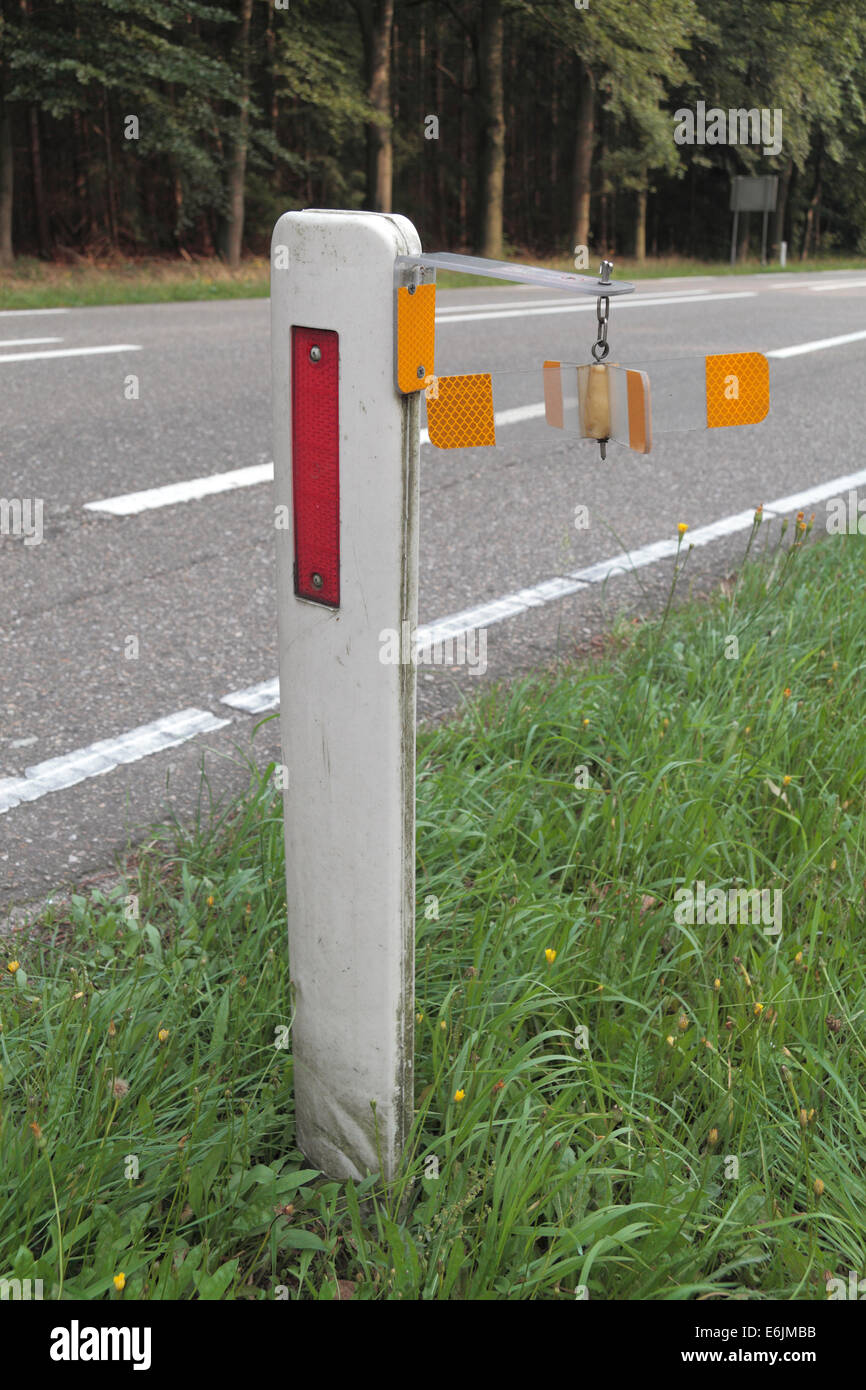 Unusual road side reflection marker with spinning reflectors.  Netherlands (Holland). Stock Photo