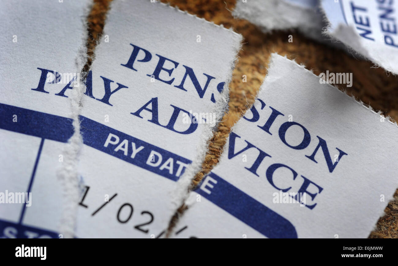 TORN PRIVATE PENSION PAY ADVICE RE PENSIONS INCOMES COMPANY EMPLOYMENT MORTGAGES WAGES PENSION POT MONEY RETIREMENT CASH UK Stock Photo