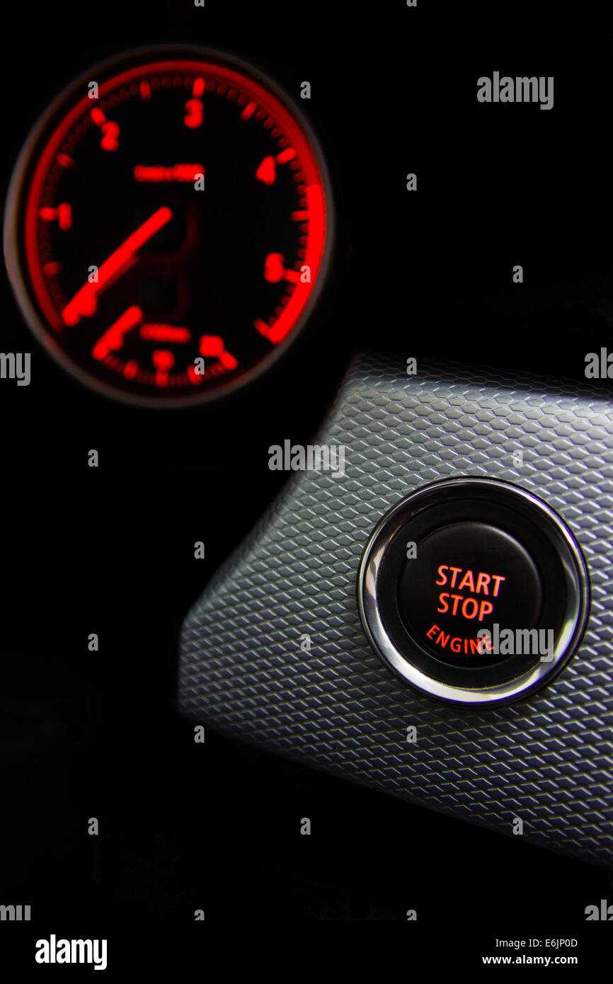 Start Stop engine button in sport car Stock Photo