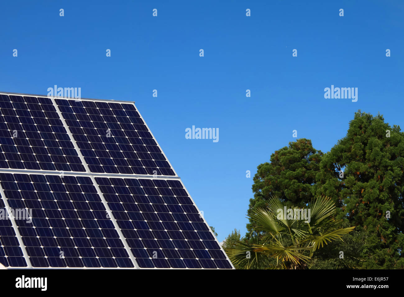 Green Photography: Solar Panel and blue sky Stock Photo - Alamy