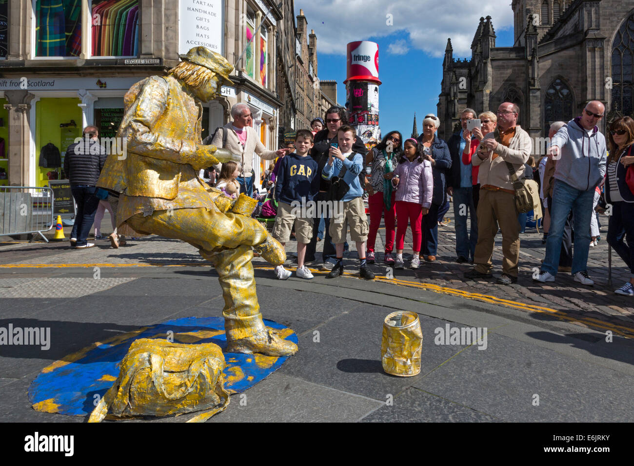 Street entertainer dressed as a statue in a sitting position without a support, during the Edinburgh Fringe Festival, Edinburgh, Stock Photo