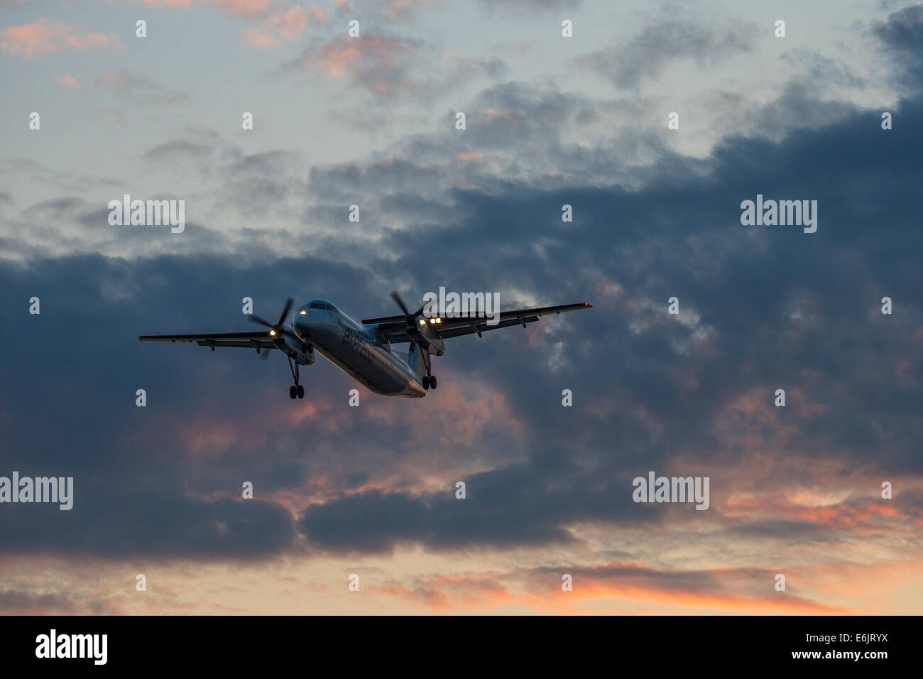 Commercial airliner Dash 8 Turboprop on final approach for landing-Victoria, British Columbia, Canada. Stock Photo