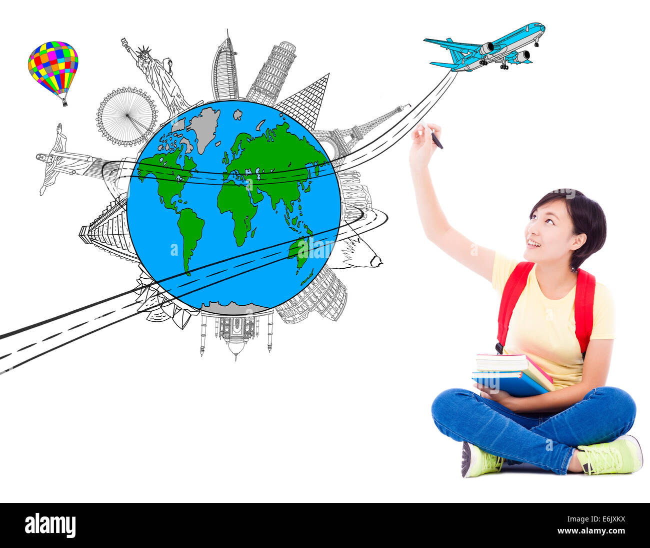 happy young woman drawing a travel trip planning Stock Photo
