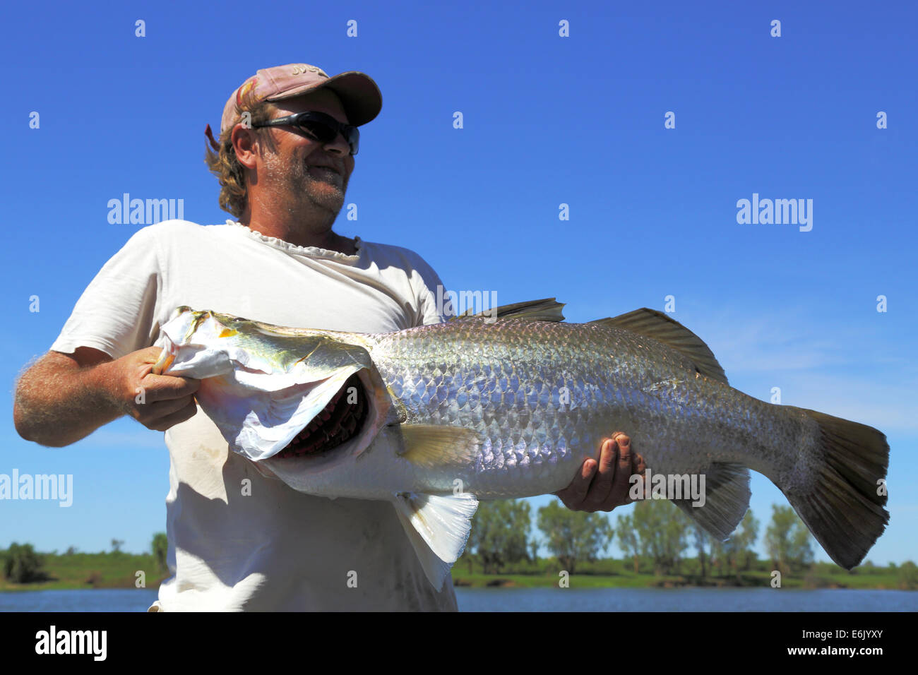 Man holding blue runner fish;Corpus christi texas usa Stock Photo - Alamy