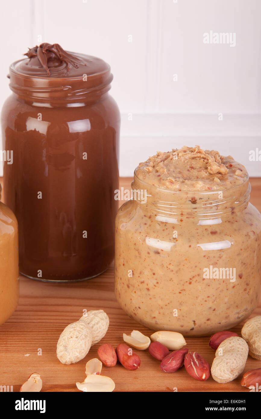 home made peanut butter and nuts on the table Stock Photo