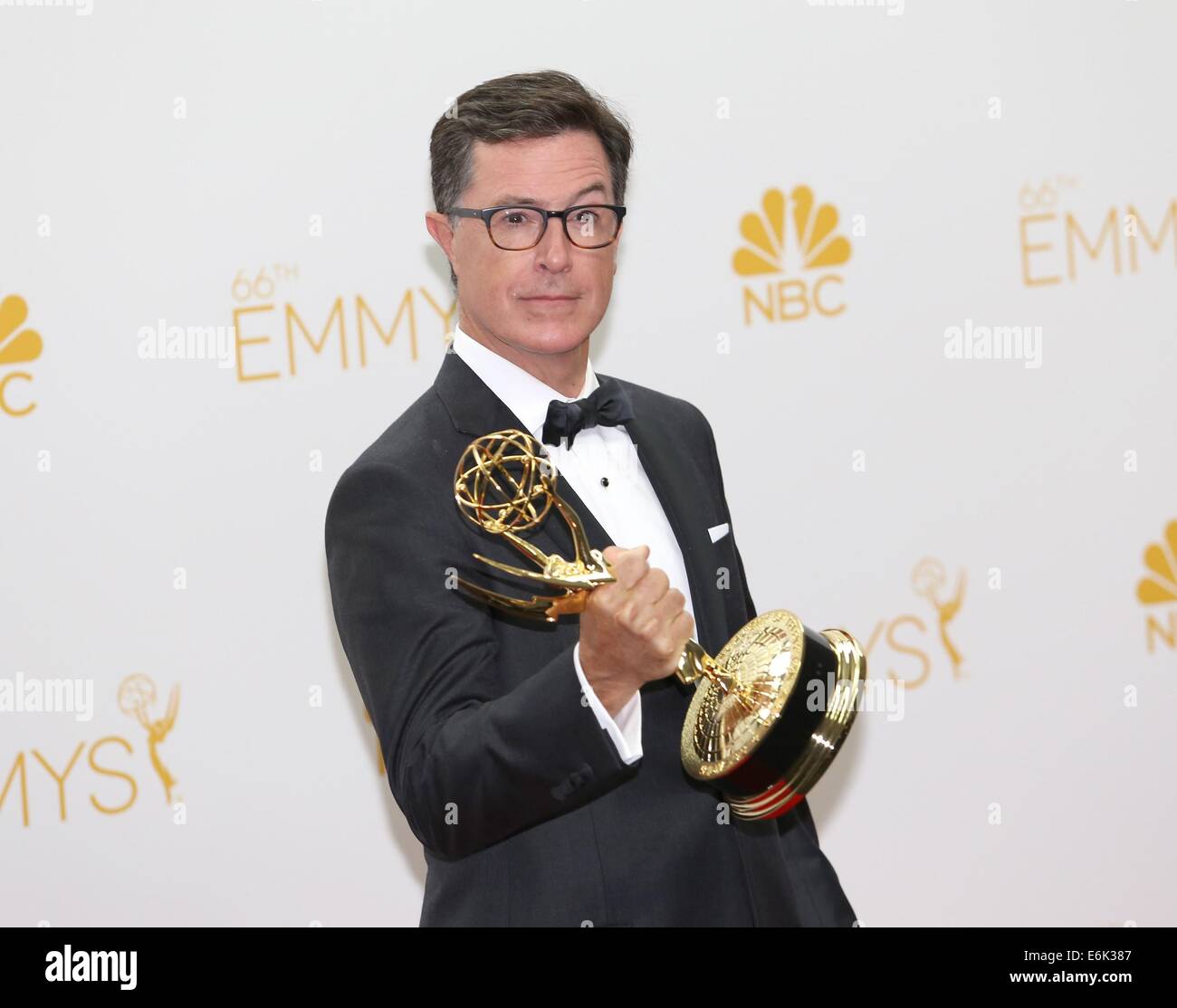 Los Angeles, CA, USA. 25th Aug, 2014. Stephen Colbert, Outstanding Variety, Music Or Comedy Series Winner and Outstanding Writing for a Variety Series, both for 'The Colbert Report', in the press room for The 66th Primetime Emmy Awards 2014 EMMYS - Press Room, Nokia Theatre L.A. LIVE, Los Angeles, CA August 25, 2014. Credit:  James Atoa/Everett Collection/Alamy Live News Stock Photo
