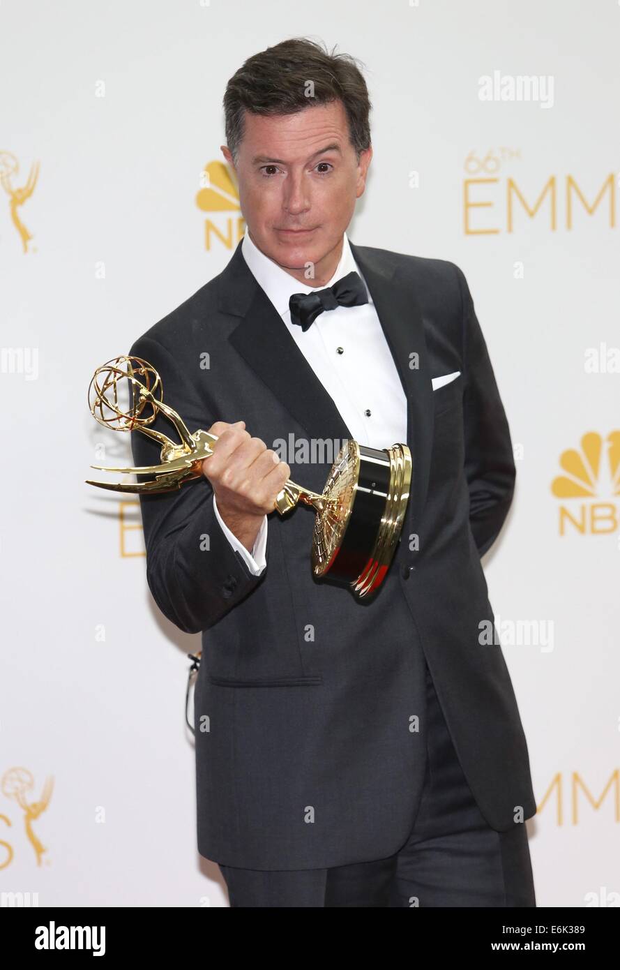 Los Angeles, CA, USA. 25th Aug, 2014. Stephen Colbert, Outstanding Variety, Music Or Comedy Series Winner and Outstanding Writing for a Variety Series, both for 'The Colbert Report', in the press room for The 66th Primetime Emmy Awards 2014 EMMYS - Press Room, Nokia Theatre L.A. LIVE, Los Angeles, CA August 25, 2014. Credit:  James Atoa/Everett Collection/Alamy Live News Stock Photo