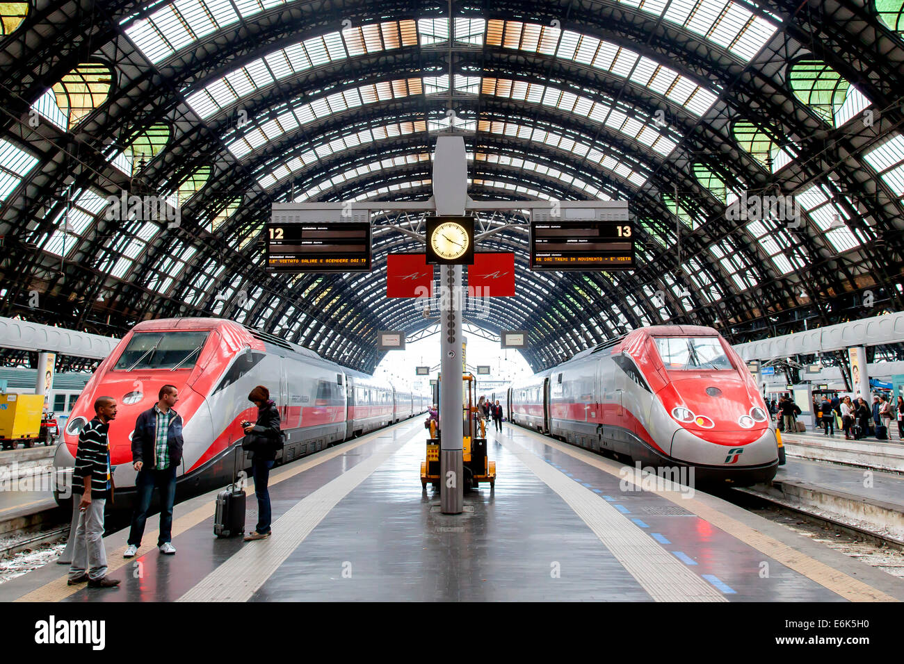 Hall in the central railway station, Stazione Centrale, with Frecciarossa high-speed trains, Milan, Lombardy, Italy Stock Photo