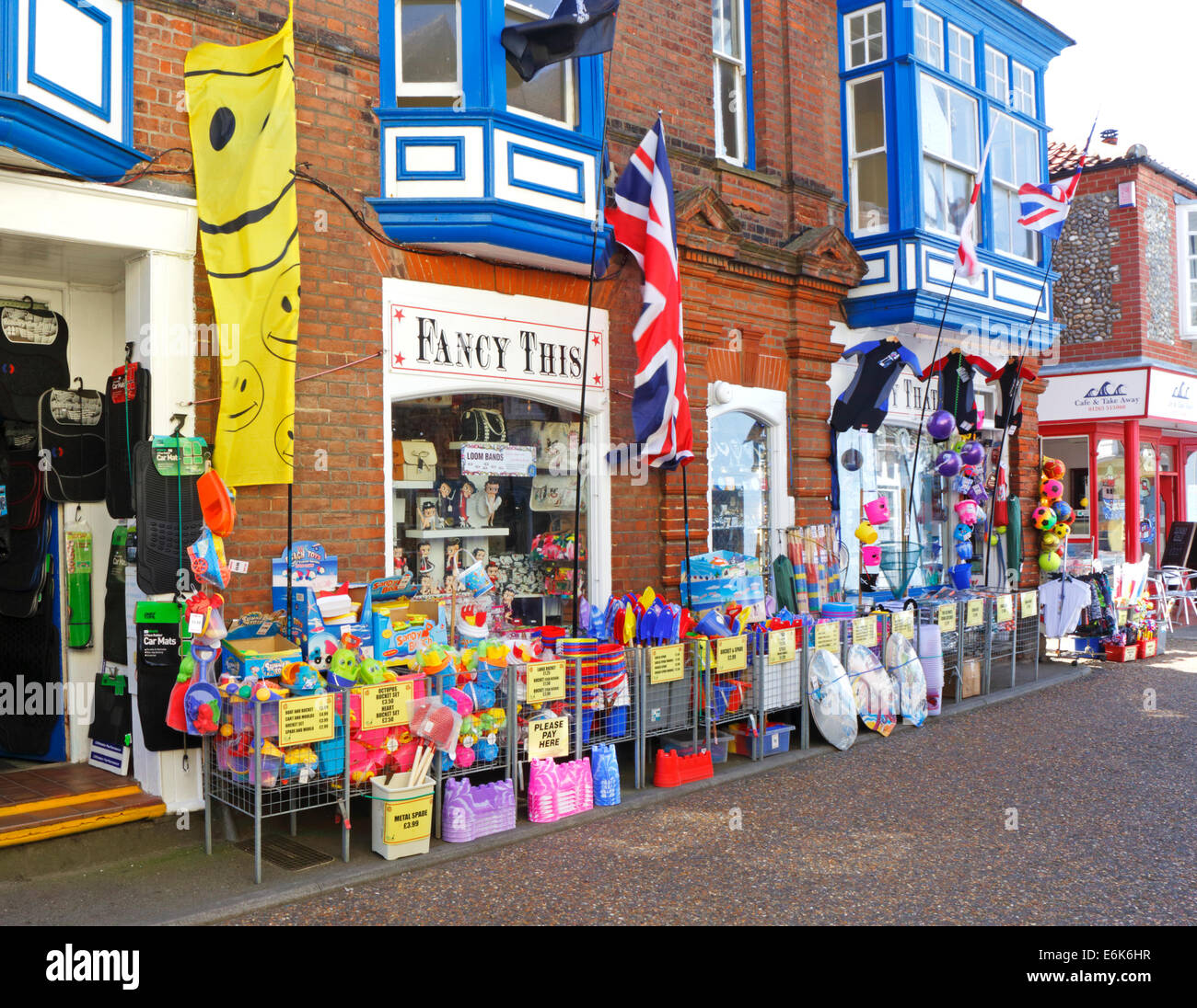 Beach goods for sale outside a shop in the east coast resort of Cromer, Norfolk, England, United Kingdom. Stock Photo