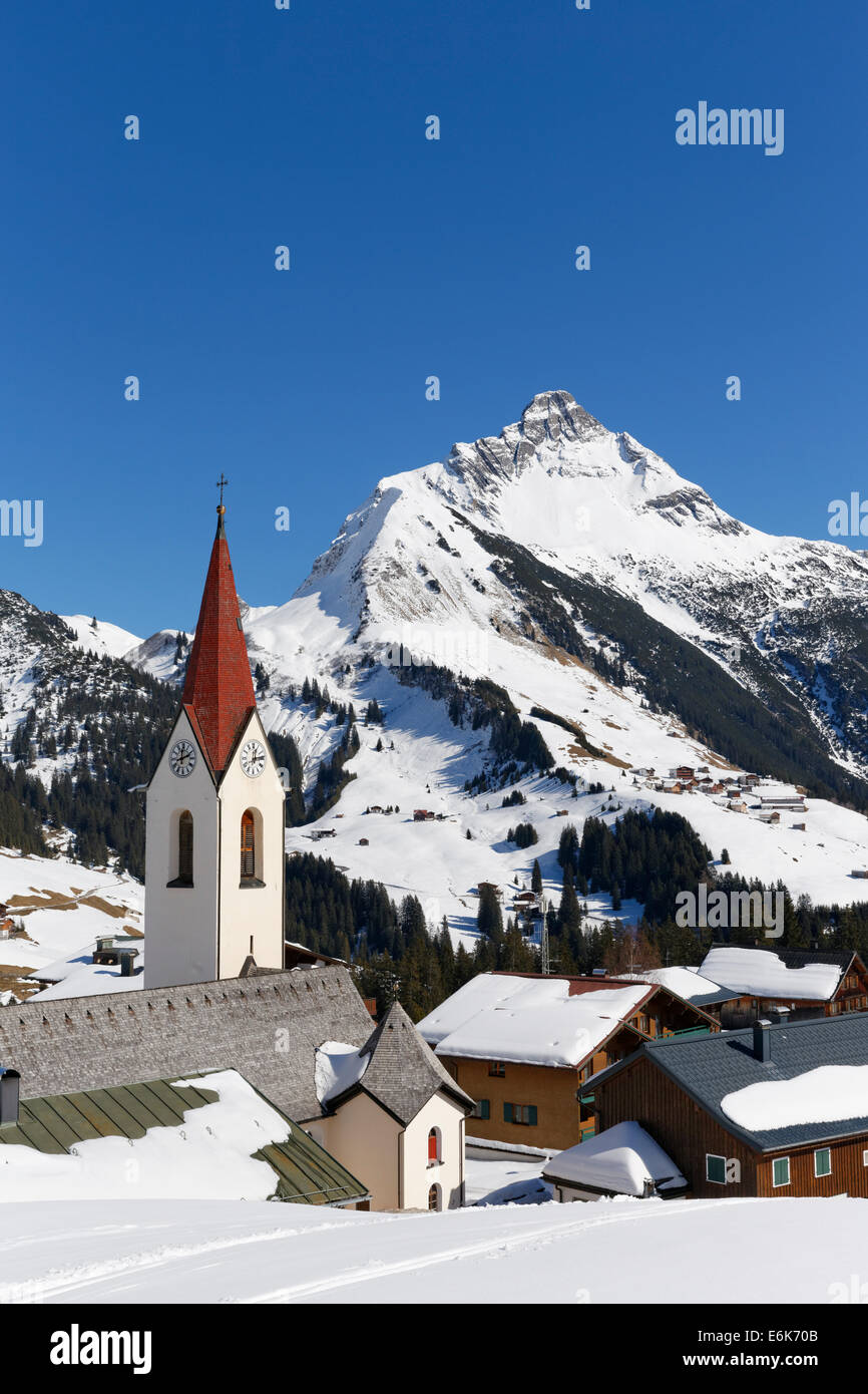 View of the community of Warth, Bregenz Forest, Vorarlberg, at the back Mt Biberkopf in Tyrol, Austria Stock Photo