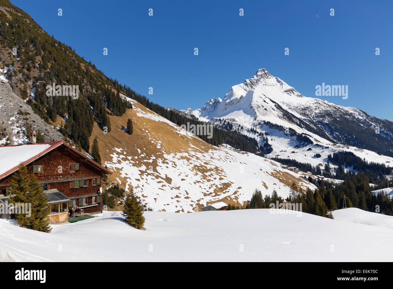 Mountain hut in Warth, Bregenz Forest, Vorarlberg, Biberkopf Mountain at the back in Tyrol, Austria Stock Photo