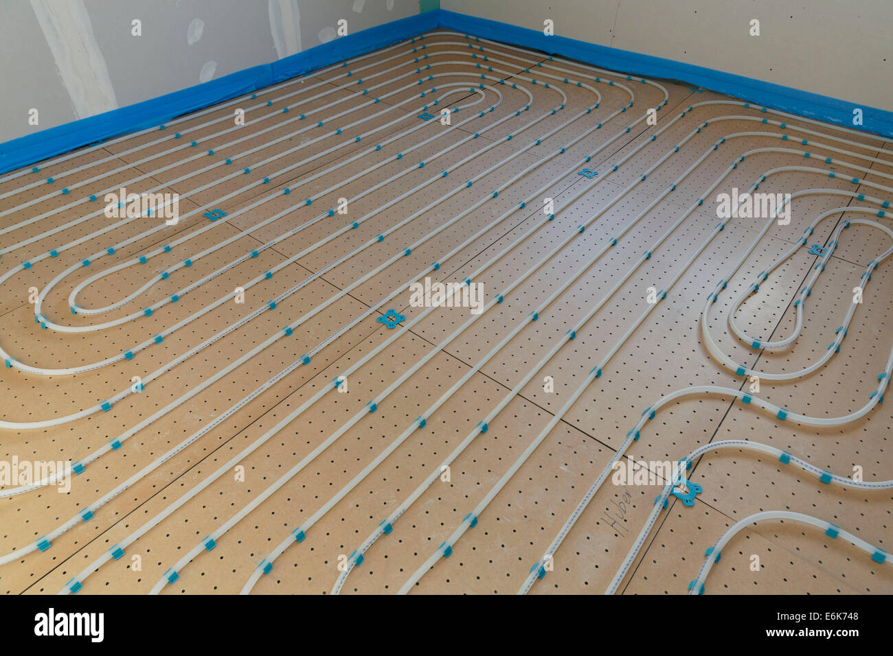 Flexible tubes or pipes of an under floor heating Stock Photo