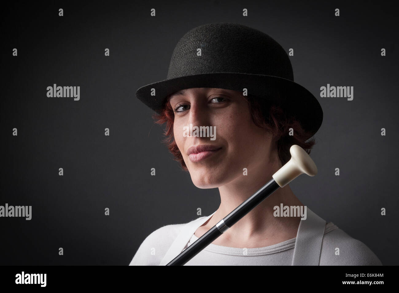 woman with bowler hat and cane Stock Photo - Alamy