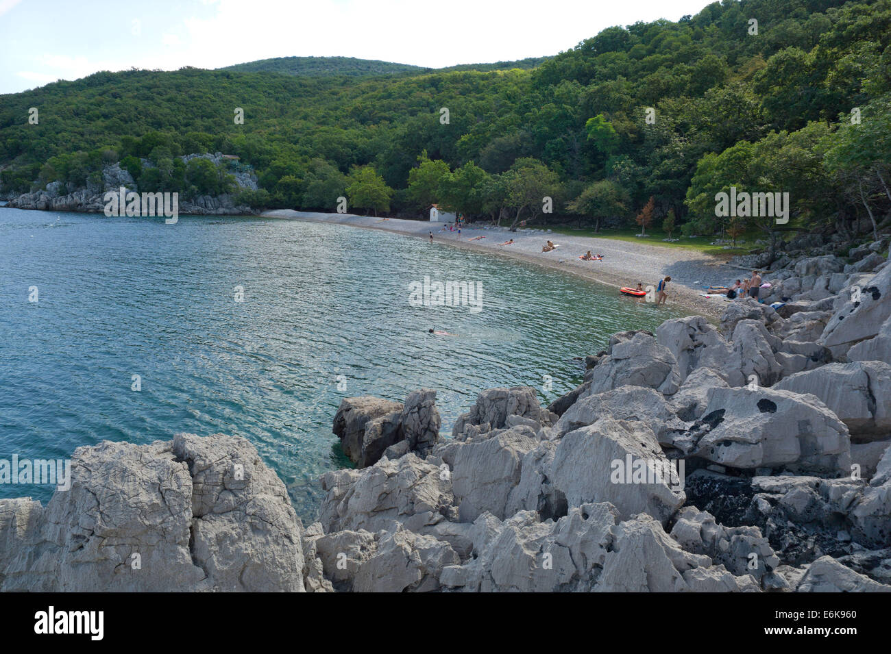 The beach at Porozina village at the north end of the island of Cres ...