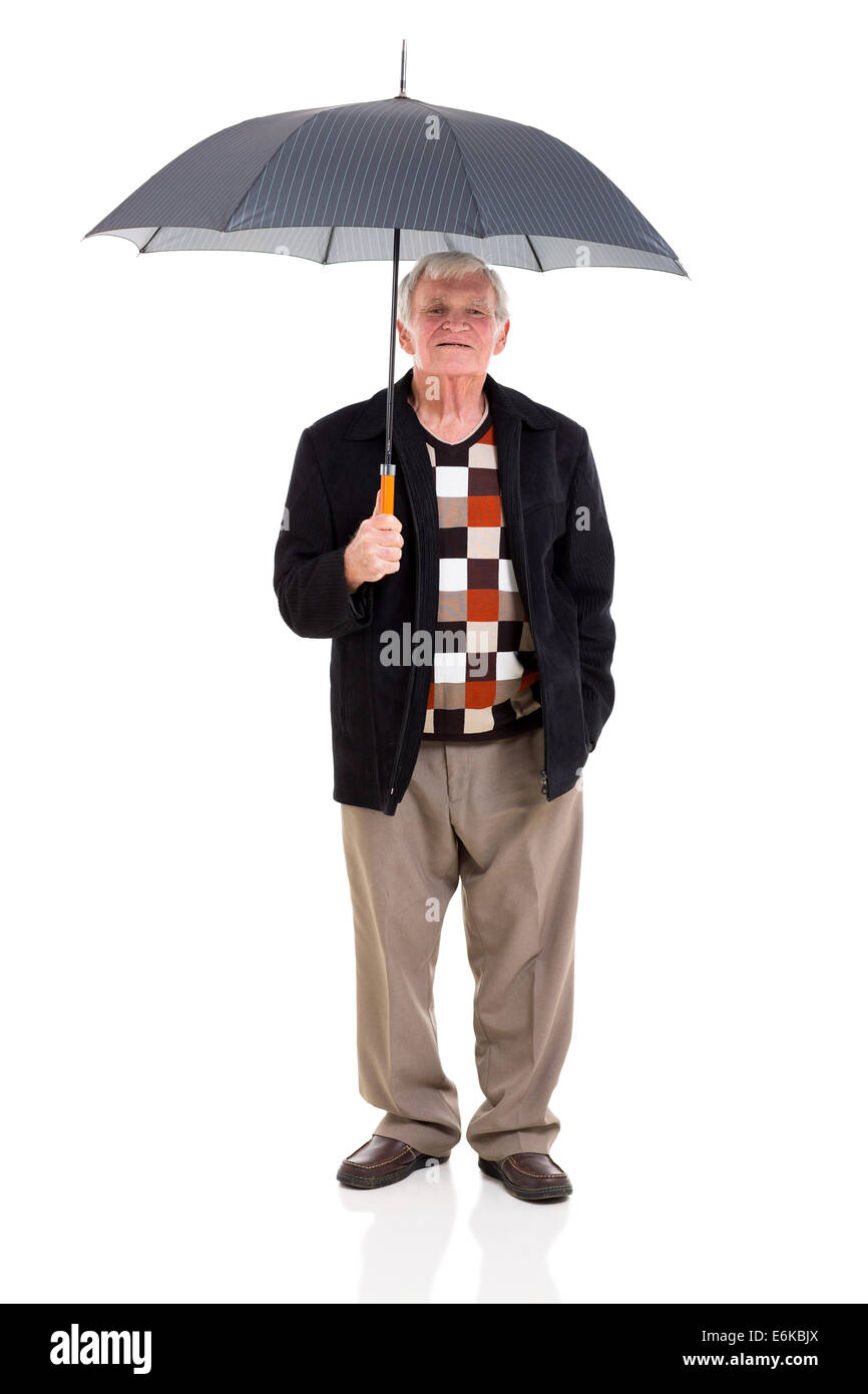 retired man holding umbrella on white background Stock Photo