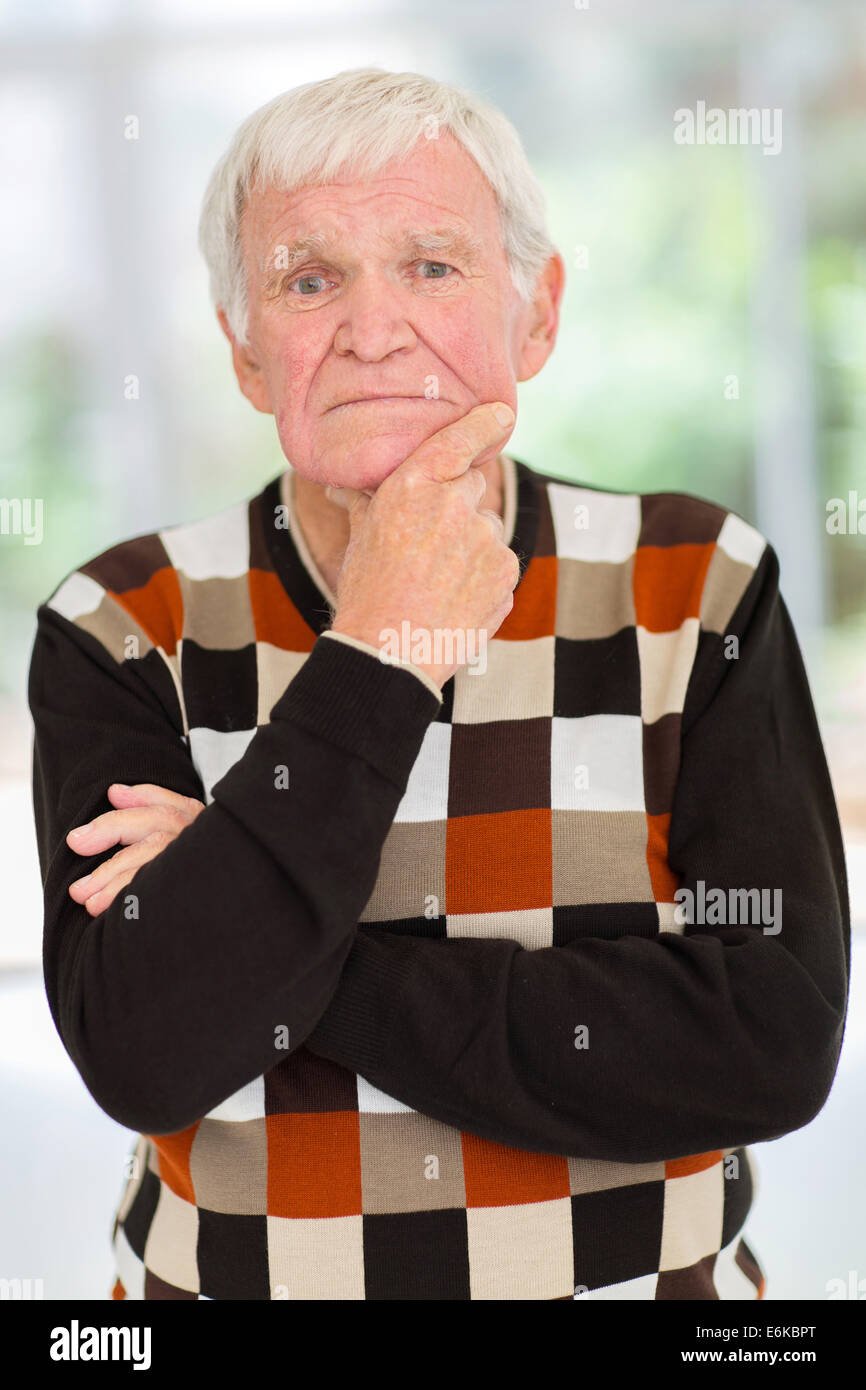 Elderly man relaxing at home hi-res stock photography and images - Alamy
